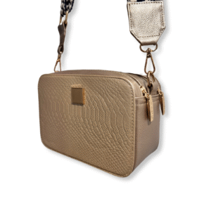 Cartera manos libres en cuero con cargadera tejida Lola dorado